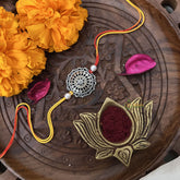 Vriksham Rakshabandhan Sliver Plated Round Shape Floral Rakhi-RB155